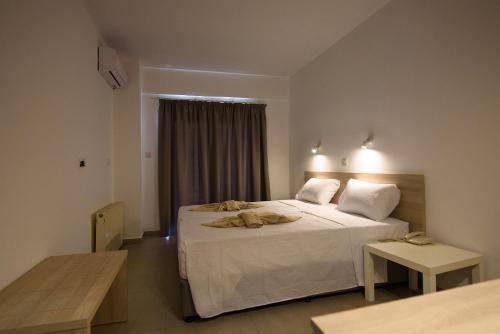 Ένα ή περισσότερα κρεβάτια σε δωμάτιο στο Evabelle Napa Hotel Apartments