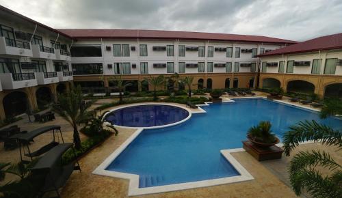 Bazén v ubytování Hotel Oazis nebo v jeho okolí