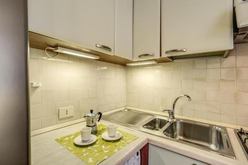 Kuchyňa alebo kuchynka v ubytovaní GuestHouse o Affittacamere Casa Fienaroli 2