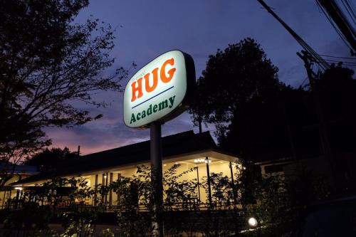 a sign for a buigadelle restaurant in front of a building at Chiangmai Midpoint Activity Hostel in Chiang Mai