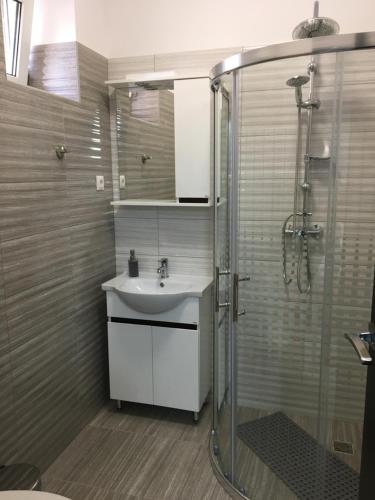 Koupelna v ubytování Kristály apartmanok