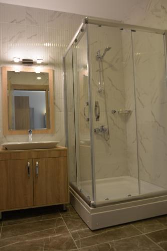 a bathroom with a shower and a sink at ITU Evi Bursa in Bursa