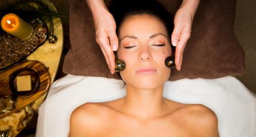 a woman getting her face set up at a spa at Royal SPA Residence in Birštonas
