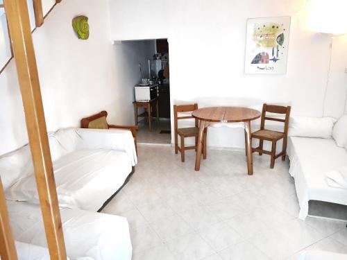 Una cama o camas en una habitación de Paradise Studios