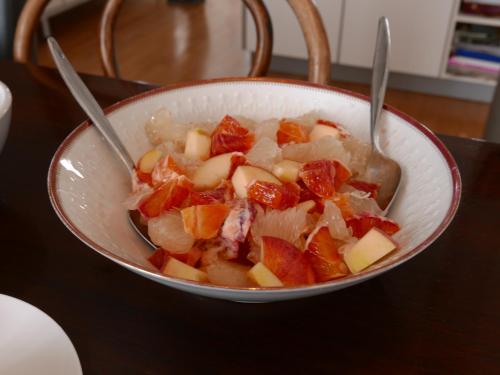 a bowl of food with fruit in it on a table at BnB chezlise in Urnäsch