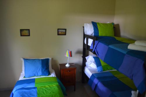 A bed or beds in a room at Casitas La Invernada