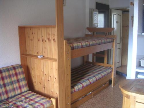 A bed or beds in a room at T2 BARCELONNETTE