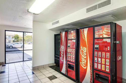 two cocacola vending machines in a building at Vagabond Inn Sylmar in Sylmar