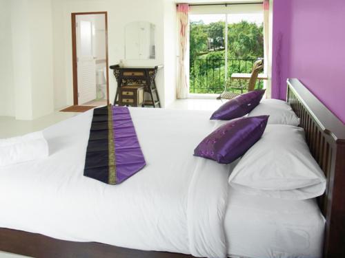 Ένα ή περισσότερα κρεβάτια σε δωμάτιο στο Spa Guest House