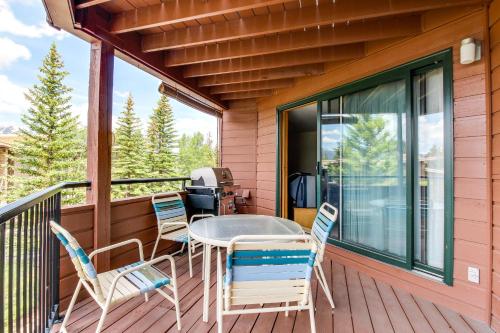a patio with chairs and a table on a deck at Lakeview Marina Place in Dillon