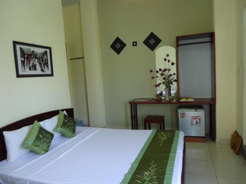 Giường trong phòng chung tại Kiman Old Town Hotel