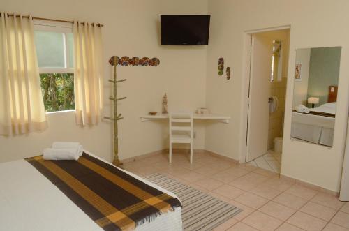 Кухня или мини-кухня в Pousada Villa Maritima
