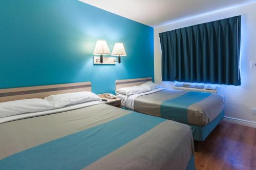 Ένα ή περισσότερα κρεβάτια σε δωμάτιο στο Motel 6-Green River, UT