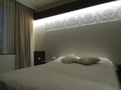 Cama o camas de una habitación en Guest House Dabi