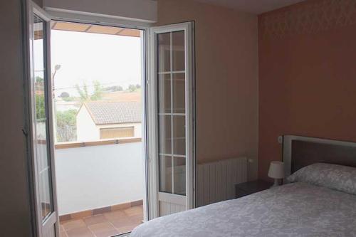 A bed or beds in a room at La Verdevilla