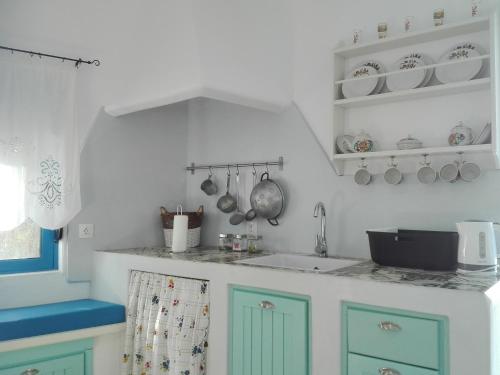 A kitchen or kitchenette at Tilos Island house