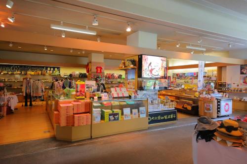 a store with a lot of products on display at Hotel Beppu Pastoral in Beppu