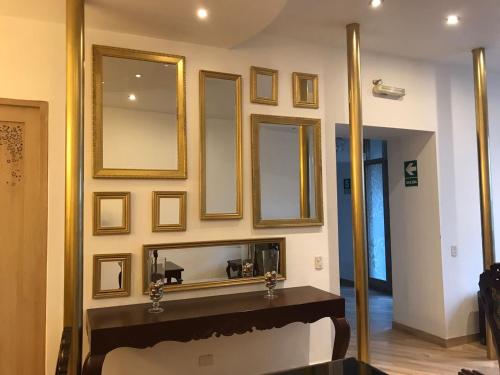 a bathroom with a mirror and a sink at Estela de Oro Hotel Boutique in Arequipa