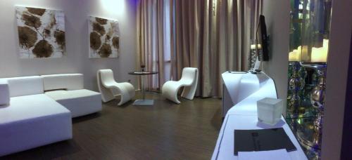 Posezení v ubytování Le Camp Suite & Spa