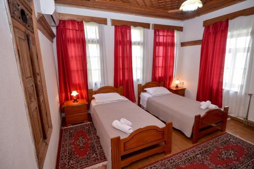 Ένα ή περισσότερα κρεβάτια σε δωμάτιο στο Hotel Kalemi