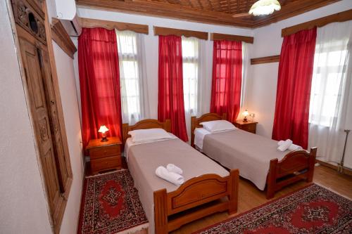 Postel nebo postele na pokoji v ubytování Hotel Kalemi