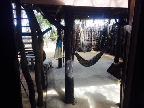 a view of a room with a hammock at Beach Hut in Arugam Bay