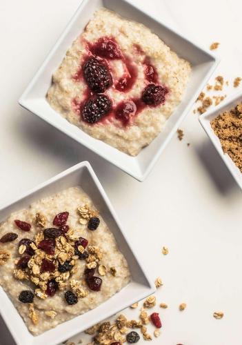 three dishes of food with berries and nuts on a table at Hyatt Place Phoenix/ Mesa in Mesa