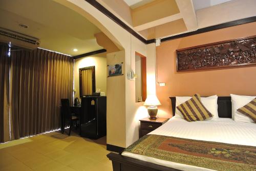 Katil atau katil-katil dalam bilik di Pissamorn House
