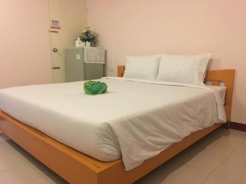 Ένα ή περισσότερα κρεβάτια σε δωμάτιο στο Go Green Resort