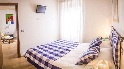 Cama o camas de una habitación en Residence Concaverde