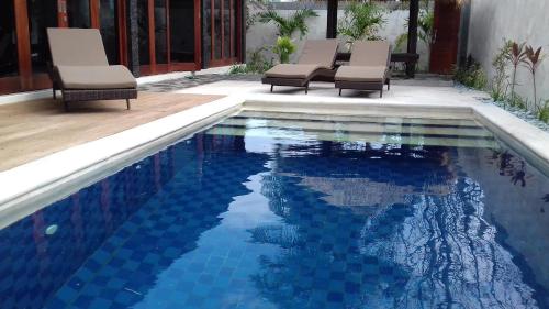 Πισίνα στο ή κοντά στο Gili Palms Villas
