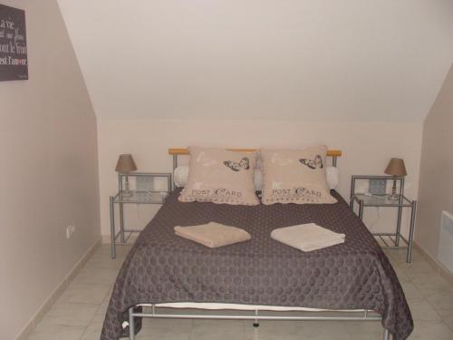 A bed or beds in a room at Chambres d'hôtes Sébastien