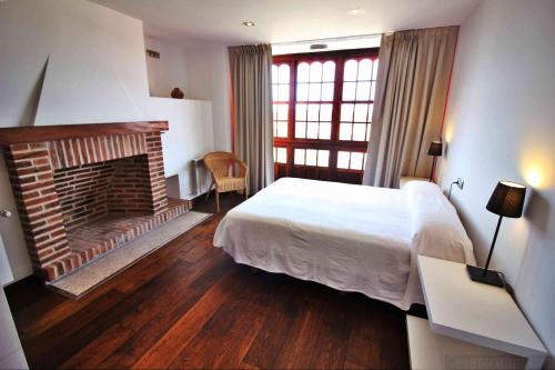 Postel nebo postele na pokoji v ubytování Casa Estrella de Garda