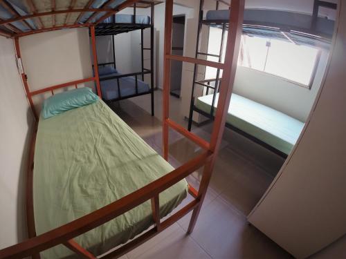 Postel nebo postele na pokoji v ubytování Hostel Aventura