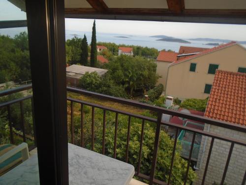 a view from the balcony of a house at Apartments Sveti Anton in Orebić