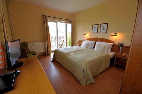 Posteľ alebo postele v izbe v ubytovaní Penzion Tematin