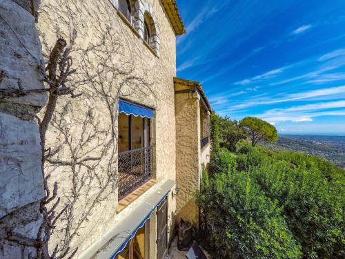 a stone house with a view at Domaine du Bois d'Amont in Cabris