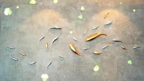 a painting of raindrops on the floor of a building at Hotel Legend Boutique in Johor Bahru