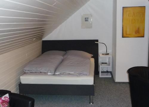 Postel nebo postele na pokoji v ubytování Stadt trifft Land