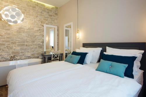 Ένα ή περισσότερα κρεβάτια σε δωμάτιο στο Magic View Apartments