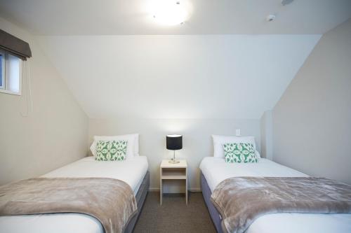 Postel nebo postele na pokoji v ubytování Vita Nova Motel