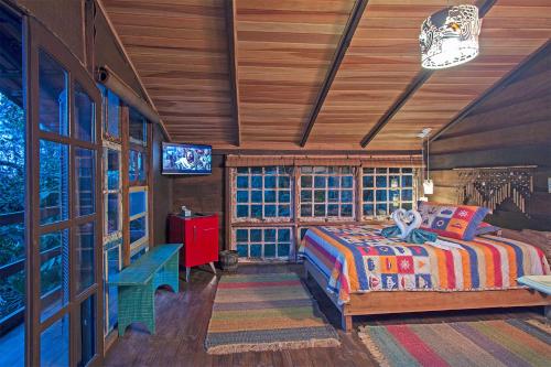 Μια τηλεόραση ή/και κέντρο ψυχαγωγίας στο Hotel Pousada Praia do Farol