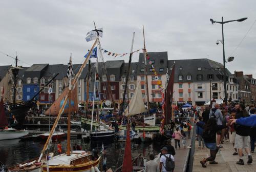 a group of boats are docked in a harbor at Hôtel Le Goëlo - Port de Paimpol in Paimpol