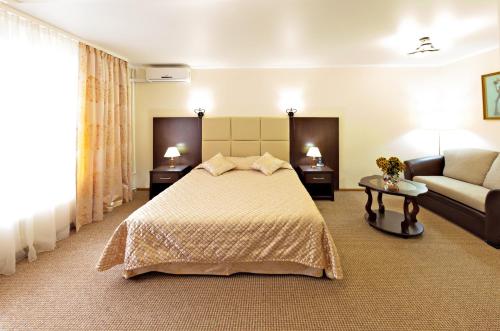 Кровать или кровати в номере Гостиница Электрон