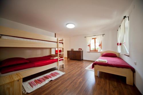 Postel nebo postele na pokoji v ubytování Villa Sandra