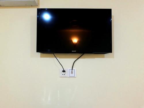 キャピトル ワンにあるテレビまたはエンターテインメントセンター