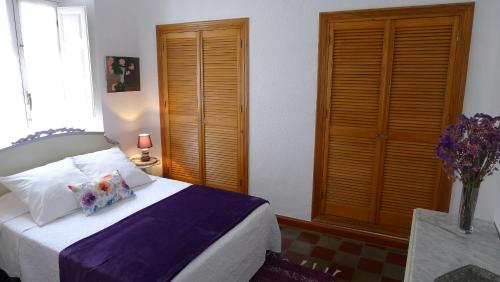 Uma cama ou camas num quarto em Casa Andaluza