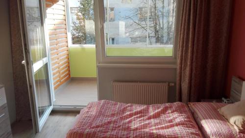 Postel nebo postele na pokoji v ubytování Apartman Jarosova