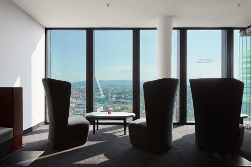 Zona de estar de HYPERION Hotel Basel