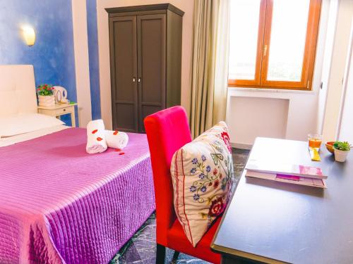 Ένα ή περισσότερα κρεβάτια σε δωμάτιο στο Diana Inn Accommodations